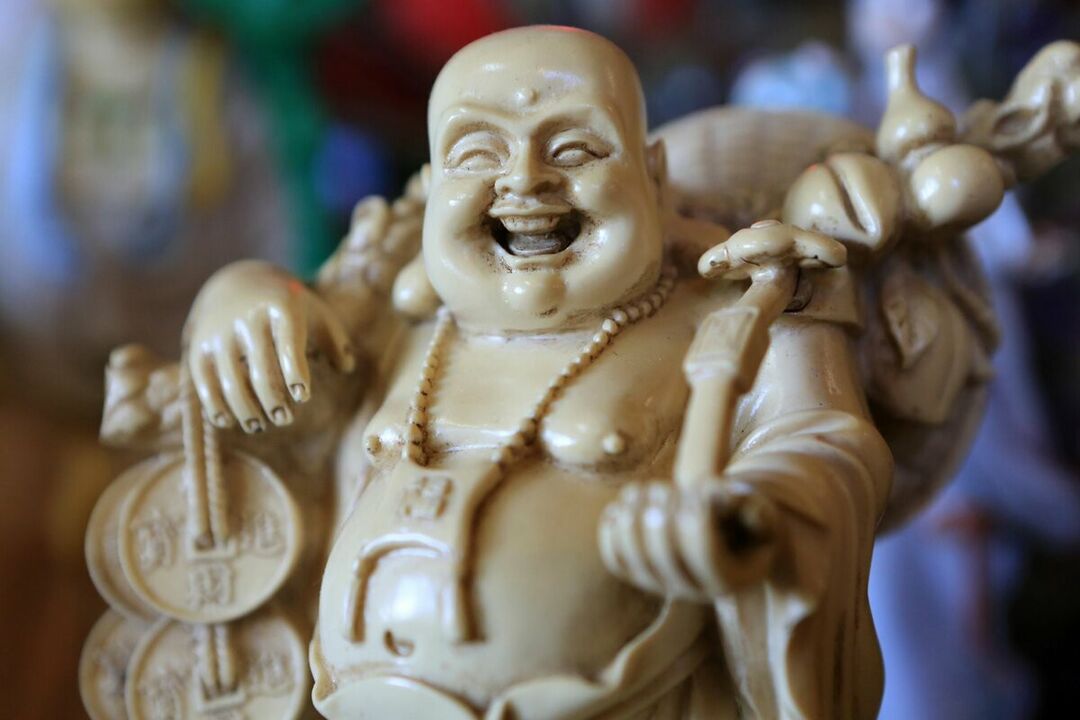 Charme santé et bien-être de la famille - Bouddha qui rit